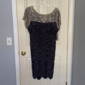 Special occasion dress. Grey in color with tan multi sequins on top.